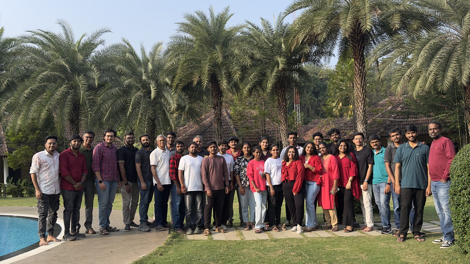 The team gathered outdoors